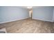 Bright living room with hardwood floors, neutral walls, and lots of natural light at 611 Bernhard Rd, Fayetteville, GA 30215