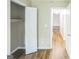 Bedroom with a closet, neutral walls, and hardwood flooring for a comfortable space at 3260 Russell St, Hapeville, GA 30354