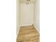 Compact laundry room with wood flooring and neutral paint, offering practicality at 3260 Russell St, Hapeville, GA 30354