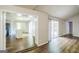 Inviting living room featuring hardwood floors and seamless flow to the kitchen at 3260 Russell St, Hapeville, GA 30354