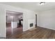 Open-concept living room with hardwood floors and a view to the kitchen at 3260 Russell St, Hapeville, GA 30354