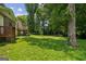 The property features a lush, green backyard at 1381 Sharon Sw St, Atlanta, GA 30314