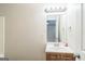 Well-lit bathroom featuring a functional vanity and a large mirror at 1381 Sharon Sw St, Atlanta, GA 30314