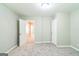 Inviting bedroom featuring neutral colors, plush carpeting, and ample closet space at 1381 Sharon Sw St, Atlanta, GA 30314