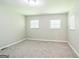 Well-lit bedroom with a comfortable carpet, neutral color scheme and great light at 1381 Sharon Sw St, Atlanta, GA 30314