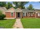 Beautiful brick house with a lovely front lawn and inviting entranceway at 1381 Sharon Sw St, Atlanta, GA 30314