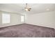 Expansive bedroom featuring neutral walls and a ceiling fan at 9046 Holder Rd, Locust Grove, GA 30248