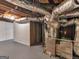 Basement shot of water heater and pipes at 100 Homestead Pl, Rex, GA 30273