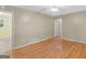Cozy bedroom with hardwood floors and ample closet space at 100 Homestead Pl, Rex, GA 30273