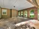 A spacious carport with brick and wood elements at 100 Homestead Pl, Rex, GA 30273
