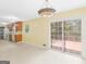 Open kitchen with a sliding door leading to the deck. Ready for entertaining! at 100 Homestead Pl, Rex, GA 30273