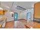 Eat-in kitchen featuring stainless steel sink and modern lighting at 1128 Milstead Ne Ave, Conyers, GA 30012