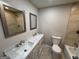 This bathroom offers a double vanity and tiled shower at 421 Safari Cir, Stone Mountain, GA 30083
