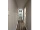 A hallway features laminate flooring with multiple doorways at 421 Safari Cir, Stone Mountain, GA 30083