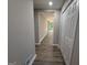 Hallway leading to the living room shows the open floor plan and closet space at 421 Safari Cir, Stone Mountain, GA 30083