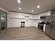 Beautiful kitchen with stainless steel appliances, new cabinets, and quartz countertops at 421 Safari Cir, Stone Mountain, GA 30083