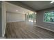 Sun-drenched living room featuring vaulted ceilings, expansive windows, and a walk-out deck to the backyard at 421 Safari Cir, Stone Mountain, GA 30083