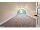 Finished attic space with plush carpeting and a dormer window at 2141 Bradbury Rd # 1, Moreland, GA 30259