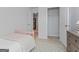 Cozy bedroom with a pink bed, dresser, and walk-in closet at 123 Meadowview Dr # 15, Temple, GA 30179