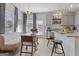Bright, open kitchen and dining area, featuring modern finishes and ample natural light, perfect for Gathering meals and gatherings at 123 Meadowview Dr # 15, Temple, GA 30179
