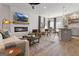This open living space features a fireplace, TV, and stylish decor, ideal for relaxation and entertaining at 123 Meadowview Dr # 15, Temple, GA 30179