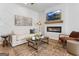 This cozy living room boasts a fireplace, TV, and stylish decor, perfect for relaxing and entertaining guests at 123 Meadowview Dr # 15, Temple, GA 30179