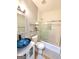 Stylish bathroom features a vessel sink, glass shower door, and modern fixtures at 910 Lilac Arbor Rd, Dacula, GA 30019