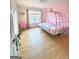 Bedroom with unique bed and ample natural light from the window at 910 Lilac Arbor Rd, Dacula, GA 30019