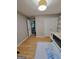 Bright bedroom with gray striped wall, large window, and pull out bed at 910 Lilac Arbor Rd, Dacula, GA 30019