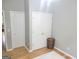 Bedroom showcasing neutral paint, hardwood floors, and closet at 910 Lilac Arbor Rd, Dacula, GA 30019