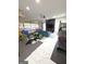 Spacious garage with fitness equipment, entertainment center and projector setup at 910 Lilac Arbor Rd, Dacula, GA 30019