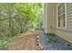 Landscaped backyard with decorative stones and retaining wall at 204 Eleanor Court, Stockbridge, GA 30281