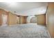 Spacious bonus room with neutral carpet and warm paint and two doors at 204 Eleanor Court, Stockbridge, GA 30281