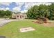 Beautiful community clubhouse and well manicured lawn at 204 Eleanor Court, Stockbridge, GA 30281