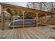 Covered boat dock showcasing boat lift and shelter for watercraft, ensuring protection and easy access at 480 Mitchell Rd, Covington, GA 30014