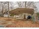 Large carport with room for boat storage and lumber, perfect for your outdoor needs at 480 Mitchell Rd, Covington, GA 30014