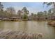Panoramic lake view featuring multiple boat docks, reflecting a vibrant waterfront community at 480 Mitchell Rd, Covington, GA 30014
