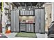 Well-organized garage with storage cabinets and ample space for vehicles and tools, maximizing functionality at 135 Adam Ridge Ln, Fayetteville, GA 30214