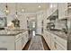 Well-equipped kitchen with granite countertops, stainless steel appliances and a central island at 135 Adam Ridge Ln, Fayetteville, GA 30214