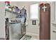 Functional laundry room equipped with modern appliances and ample storage space, making laundry chores easier at 135 Adam Ridge Ln, Fayetteville, GA 30214
