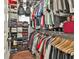 Spacious walk-in closet with ample storage space for clothing and accessories at 135 Adam Ridge Ln, Fayetteville, GA 30214