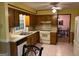 Functional kitchen with essential appliances and window above sink with view to the outside at 4402 Auburn Hills Drive, Stone Mountain, GA 30083