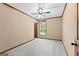 Spacious bedroom with neutral carpet, a ceiling fan, and a sunlit window at 80 David Rd, Hampton, GA 30228