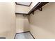 Walk-in closet features rod and shelf storage with grey carpet flooring at 80 David Rd, Hampton, GA 30228