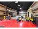 Spacious garage with a red floor at 80 David Rd, Hampton, GA 30228