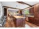 Open-concept kitchen with an island, seamlessly connecting to the inviting living area at 80 David Rd, Hampton, GA 30228