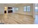 Spacious basement living area with a kitchenette and walkout access to the backyard at 6765 Crofton Dr, Alpharetta, GA 30005