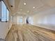 Finished basement with tile floors, recessed lights and access to the backyard at 6765 Crofton Dr, Alpharetta, GA 30005