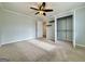Bedroom with a ceiling fan, closet and neutral paint at 6765 Crofton Dr, Alpharetta, GA 30005