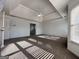 Open and airy bedroom featuring carpet floors, natural light, and tray ceiling at 6765 Crofton Dr, Alpharetta, GA 30005